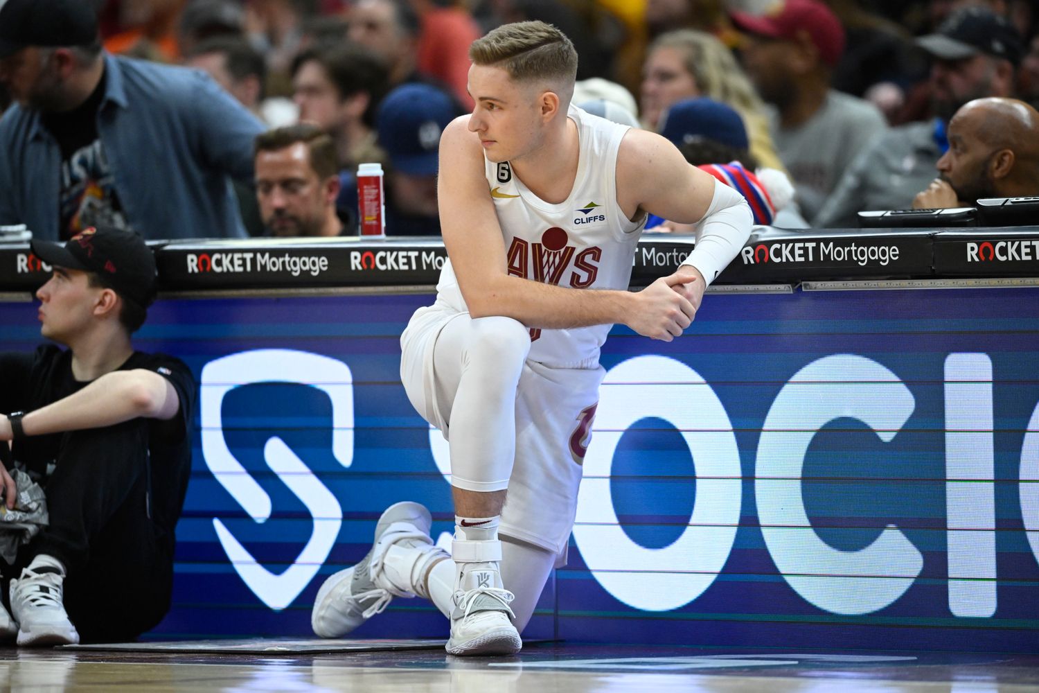 Mar 4, 2023; Cleveland, Ohio, USA; Cleveland Cavaliers guard Sam Merrill (5) kneels on the south in the fourth quarter against the Detroit Pistons at Rocket Mortgage FieldHouse. Mandatory Credit: David Richard-USA TODAY Sports